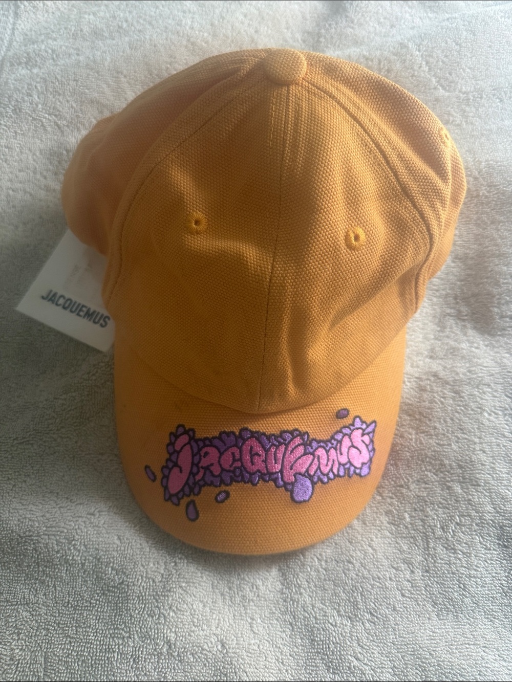 Jacquemus Orange Cap with Pink Logo Graphic